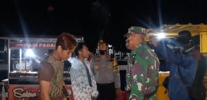 Pelanggar Protokol Kesehatan Dihukum Menyanyikan Lagu Kebangsaan