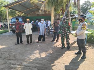 Bhabinkamtibmas Pasir Putih Kawal Peringatan Maulid Nabi SAW dan Ajak Warga Patuhi Protokol Kesehatan