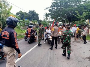Polisi dan TNI Melakukan Penyekatan Terhadap Masa JODA Yang Akan Kovoi