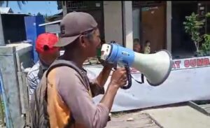 Ratusan Warga Tanda Tangan Spanduk Dukungan Hadirnya Smelter